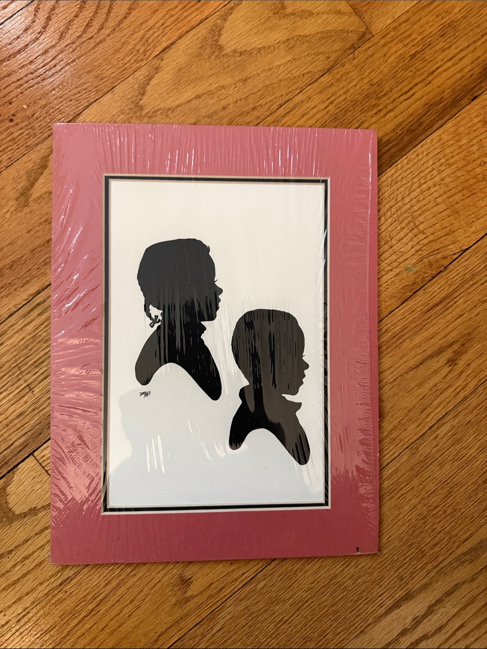 Silhouette Pink Frame Wall Art by Silhouette — Black Profile Duo